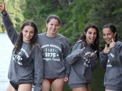 teenage girl campers smiling together at Canadian Adventure Camp