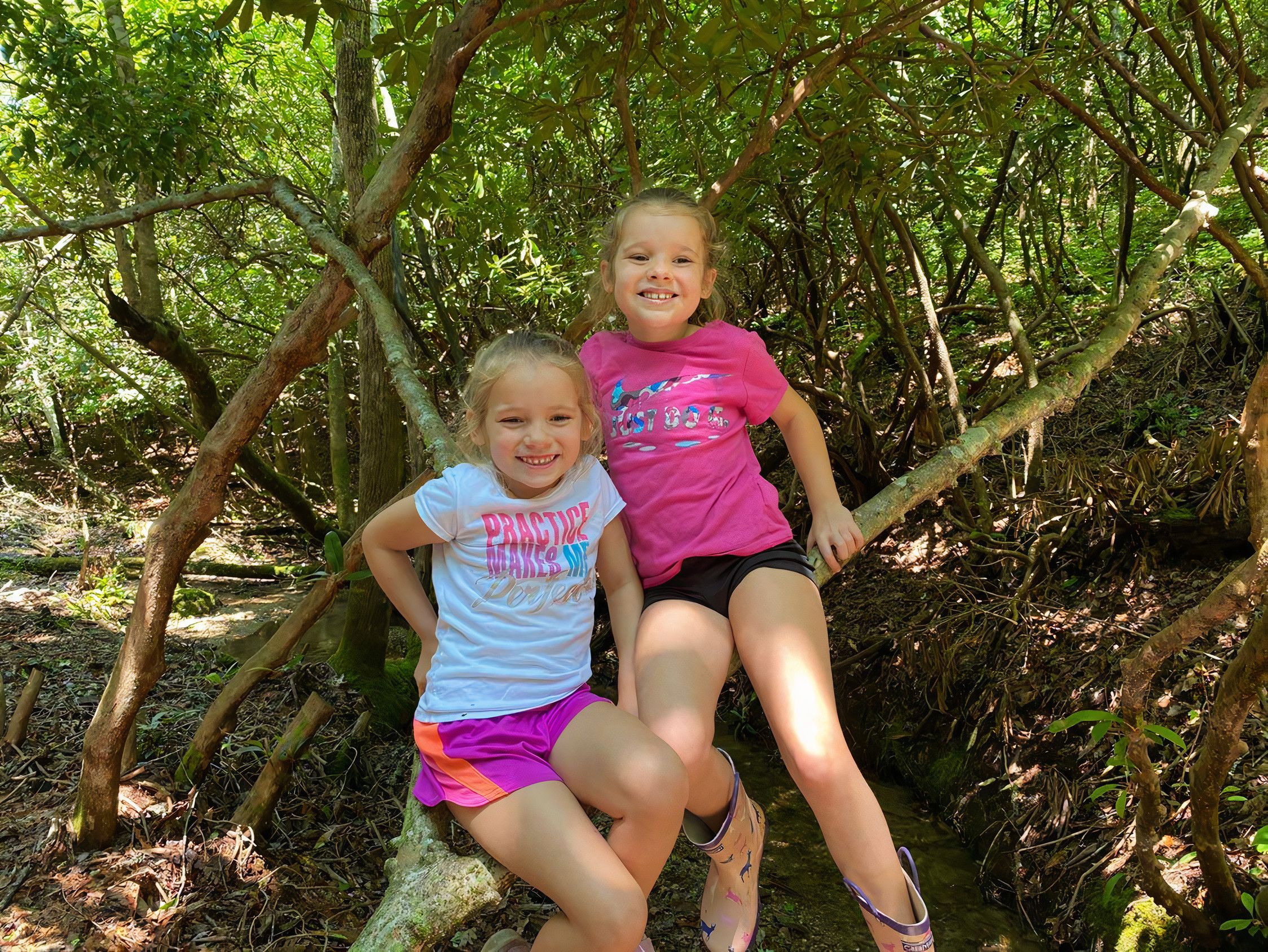 online summer camp siblings smiling at the camera