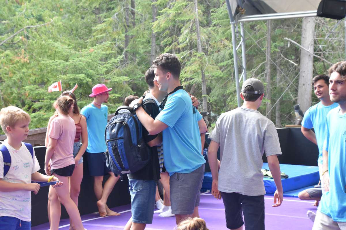 camper arriving at camp and meeting their counsellor