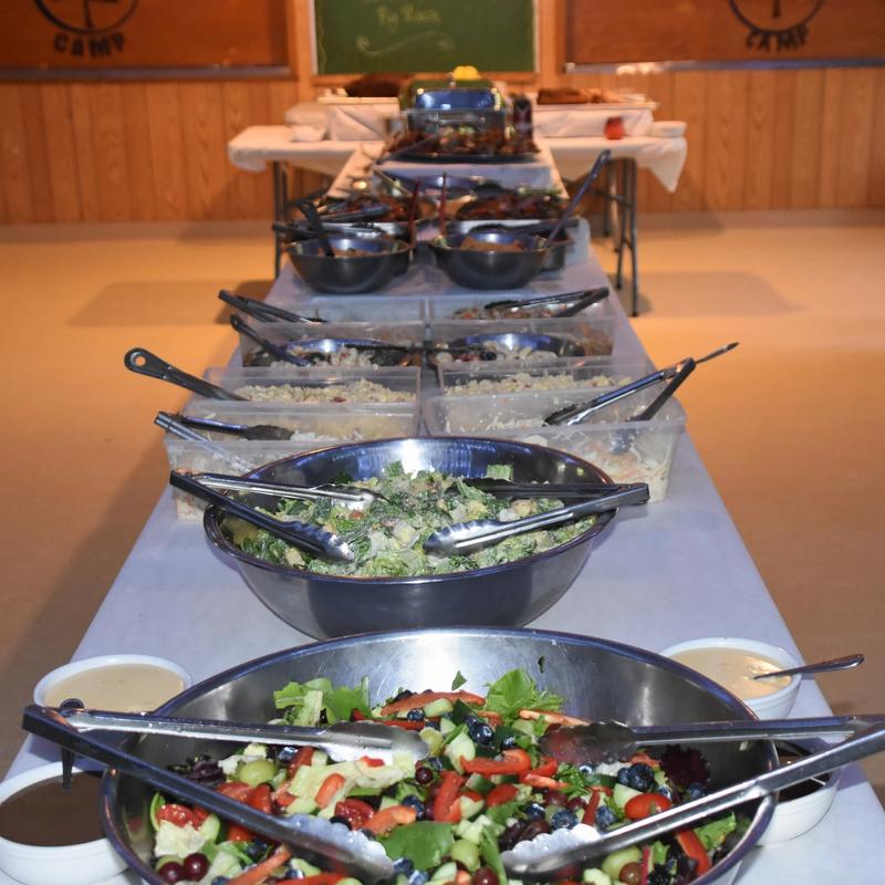 buffet food laid out on a table for a banquet dinner at Canadian Adventure Camp
