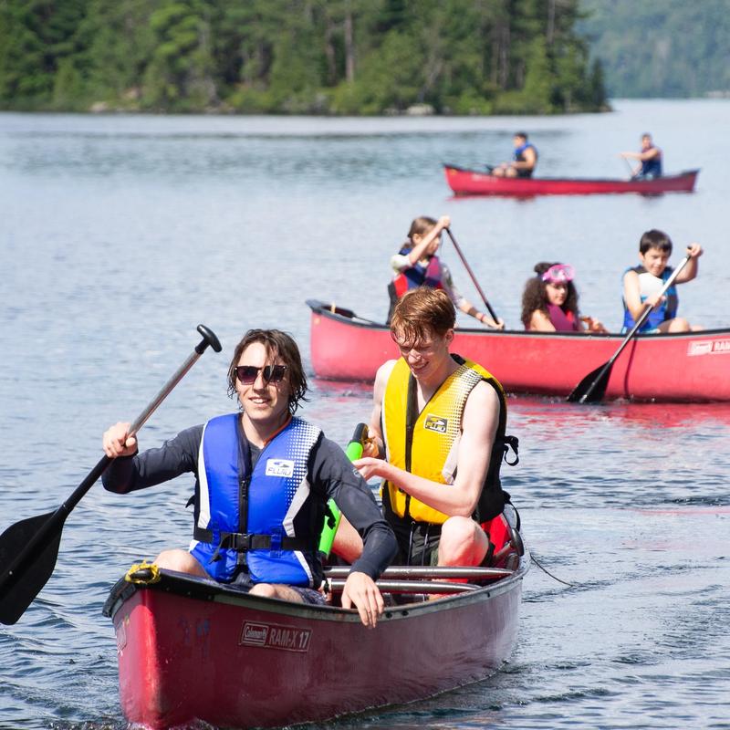 senior campers canoeing at Canadian Adventure Camp.