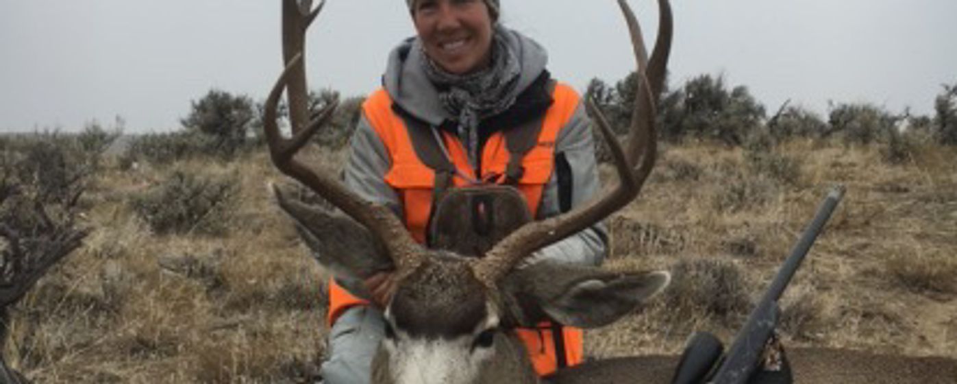 Colorado Hunter with Mule Deer
