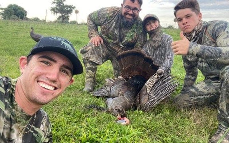 Family celebrating together after a successful hunting trip