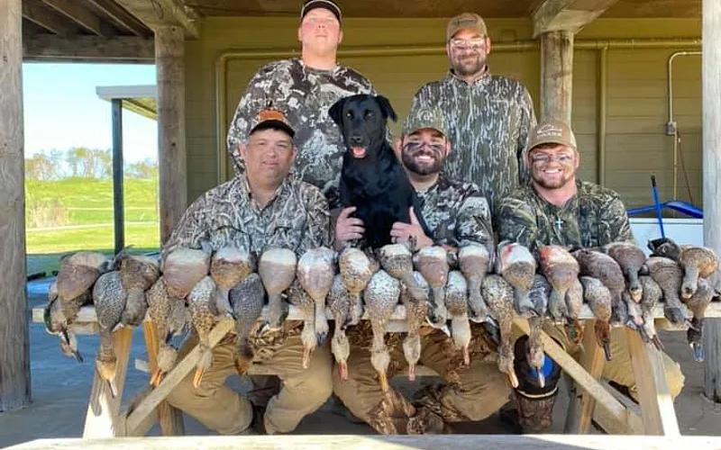 Waterfowl hunters at a Louisiana camp during a guided duck hunt