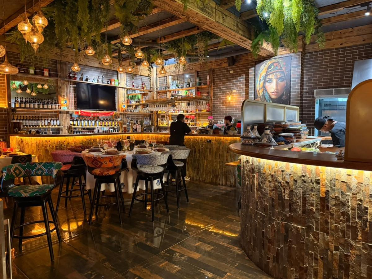 Warm ambient bar and seating area inside Mazal Punta Cana for CJ Transfer guests