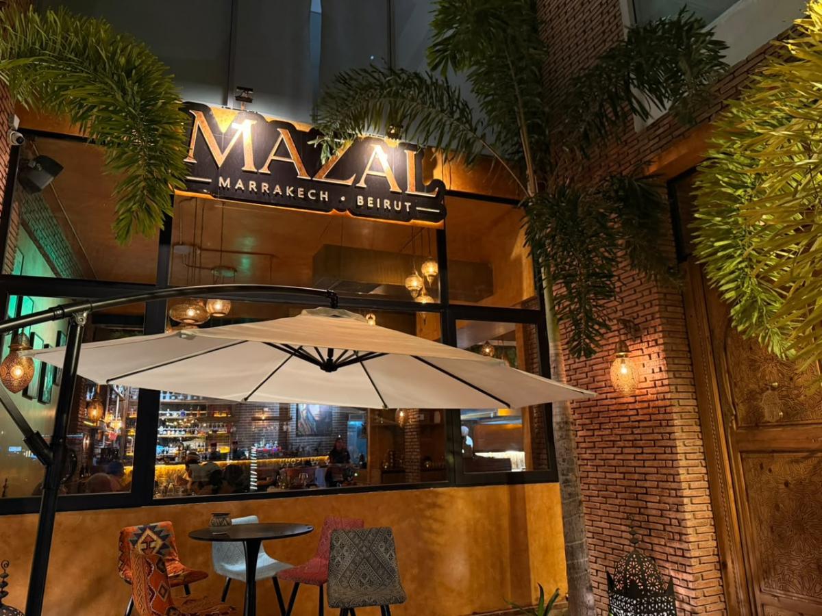 CJ Transfer private vehicle driver welcoming guests for Mazal restaurant package