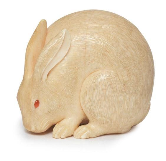 A small ivory netsuke of a hare, by Kaigyokusai Masatsugu (1813-1892),
Osaka