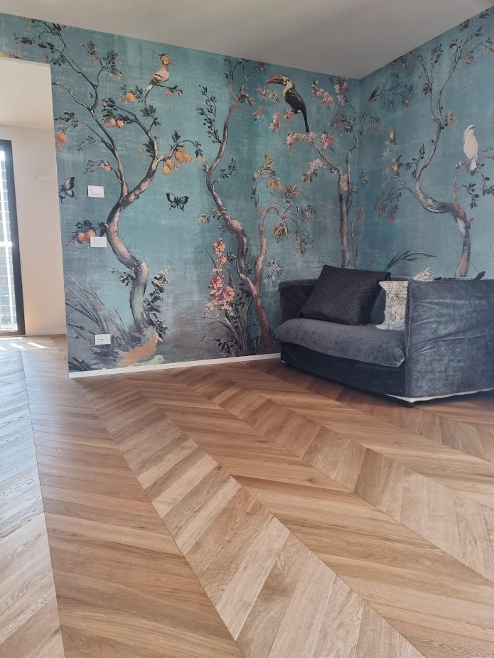 Divano su un parquet in Rovere a Spina Francese Naturale Classic