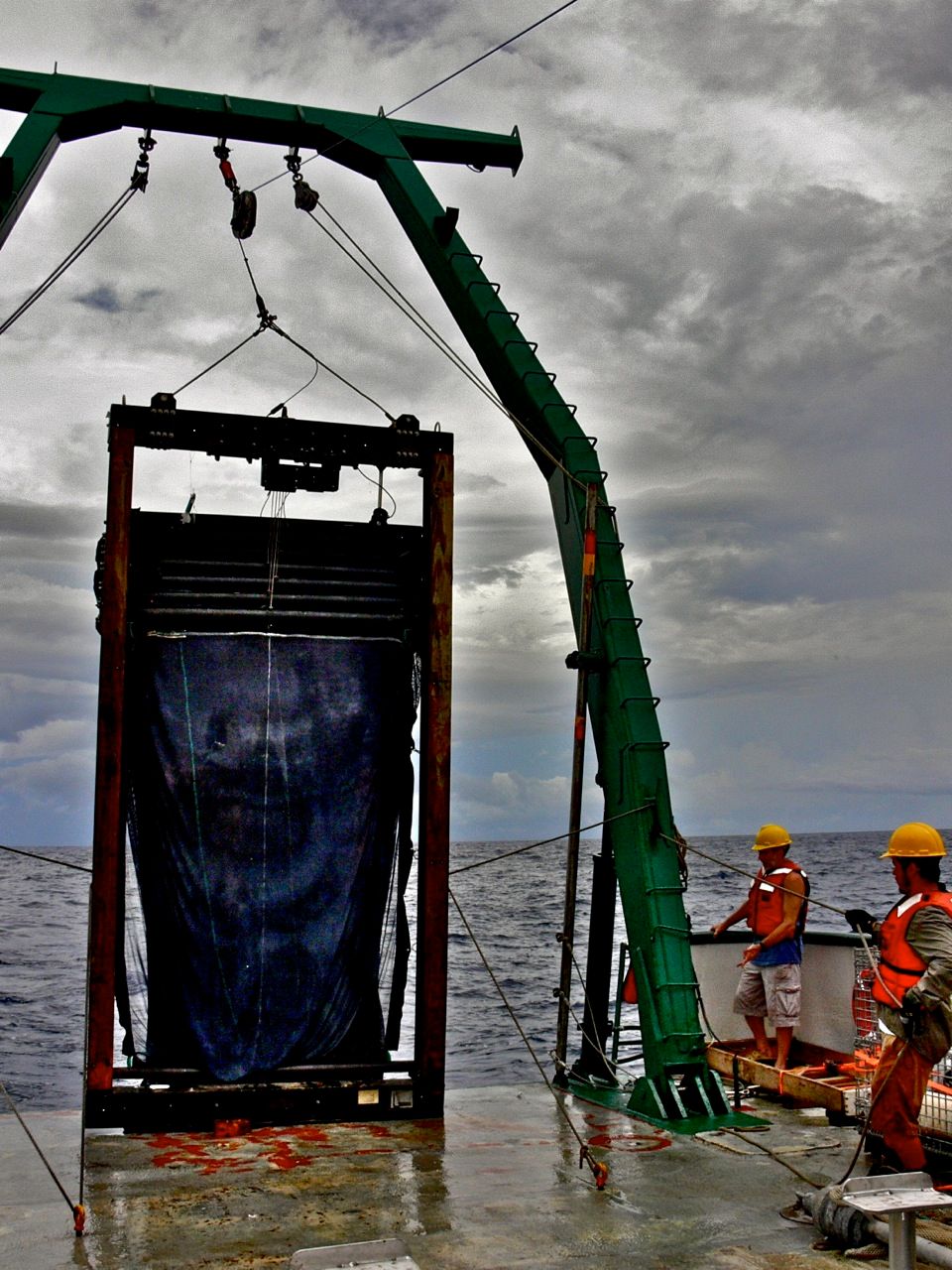 A MOCNESS frame after a deployment. Note the cross bars at the top that separate the individual nets.