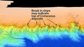 This close-up image of the Campeche Escarpment from the 2013 Falkor sonar survey shows the proposed contact between rocks of Cretaceous age (below) and younger rocks (above).