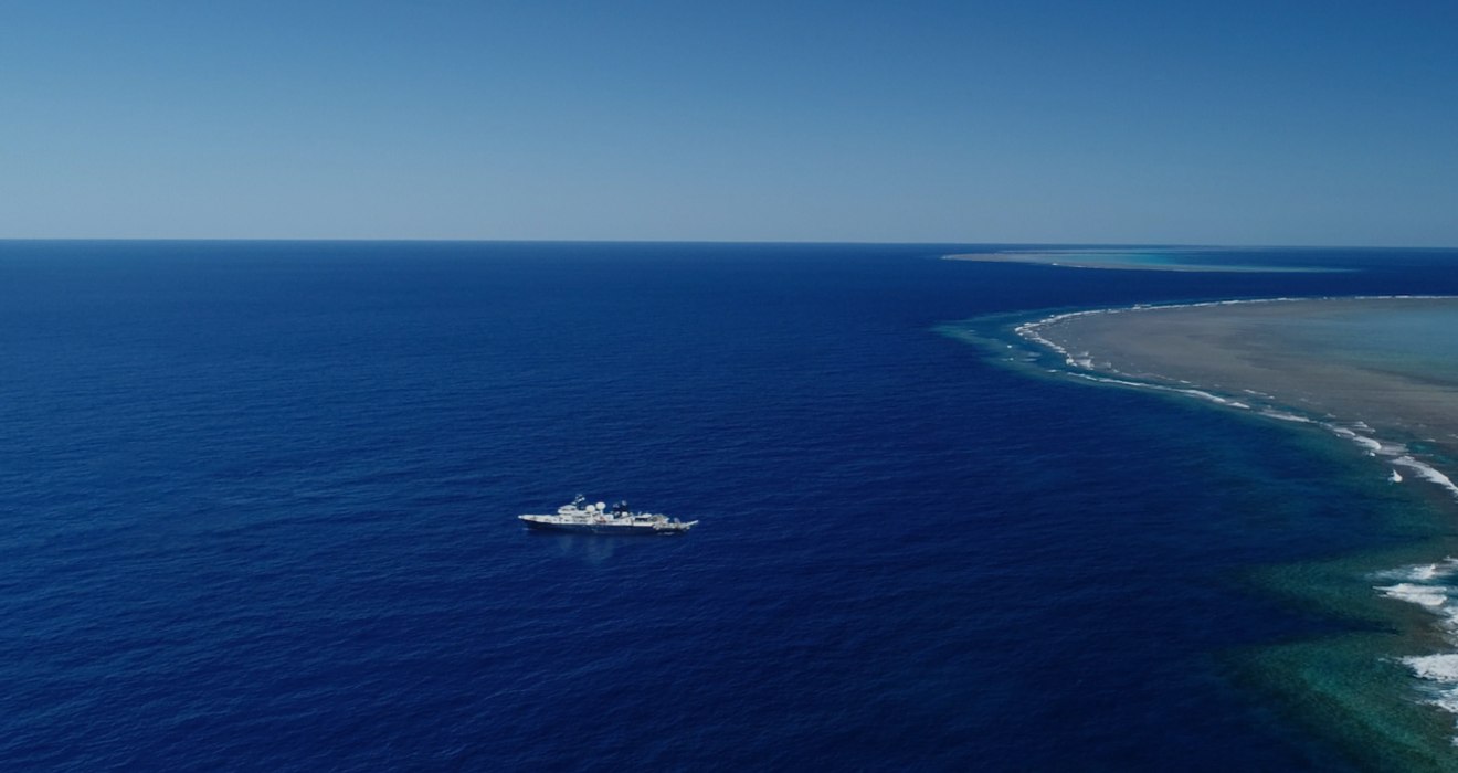 Large boat in the distance from above