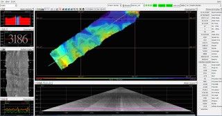This screenshot image of R/V Falkor EM302 multibeam echo sounder data processing software shows canyons and ridges extending from the Campeche Escarpment.  This is the first mapping pass of R/V Falkor along the base of the Escarpment, and this data will determine where the ship will operate as it traverses the Escarpment in the opposite direction.
