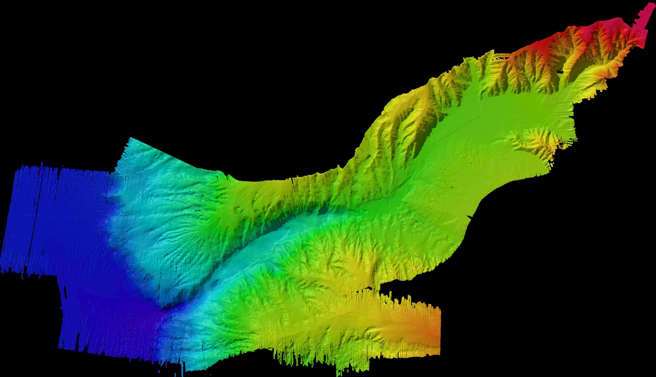 Top down view of a 3D rendition of a subsea canyon with a rainbow color scheme mapped by Falkor (too). 