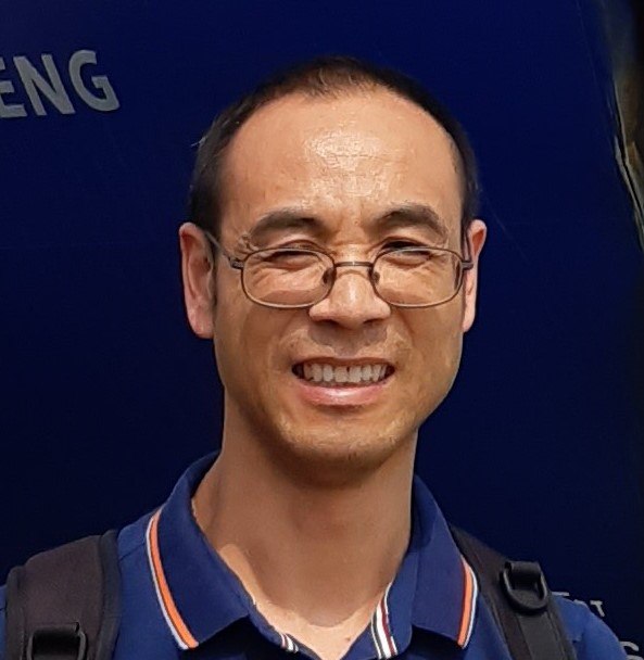 Zhi Huang headshot photo