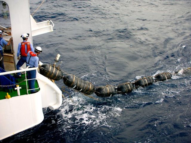 Deploying equipment for a seismic survey at the Ontong Java Plateau in 2010.