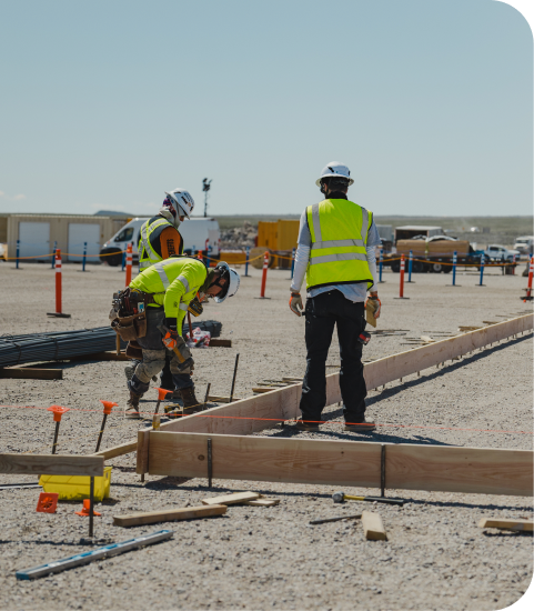 Construction crew setting forms at the Aurora site