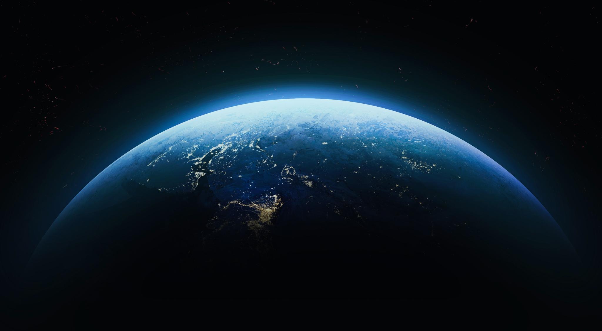 Earth at night, city lights along the terminator