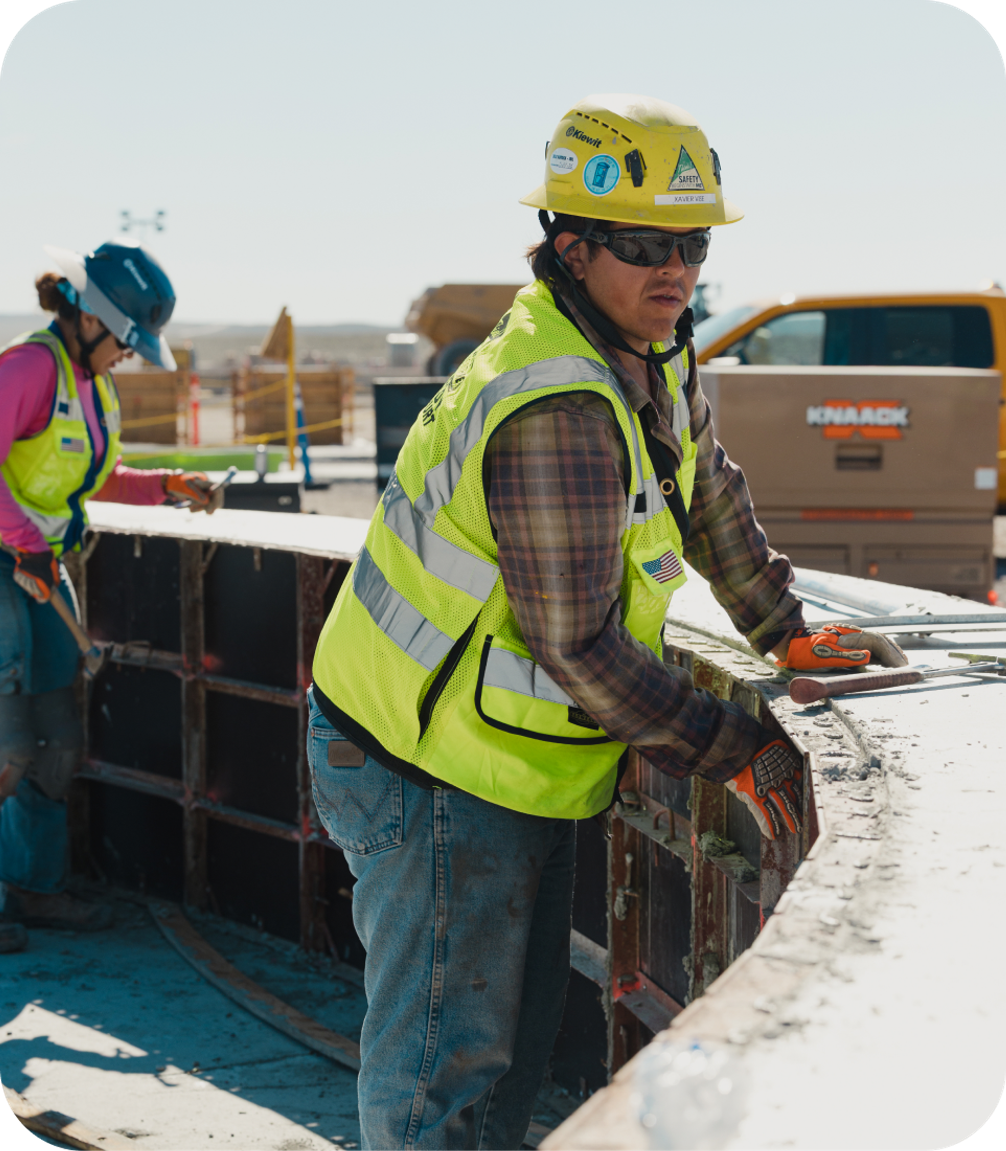 Construction crew placing rebar on site