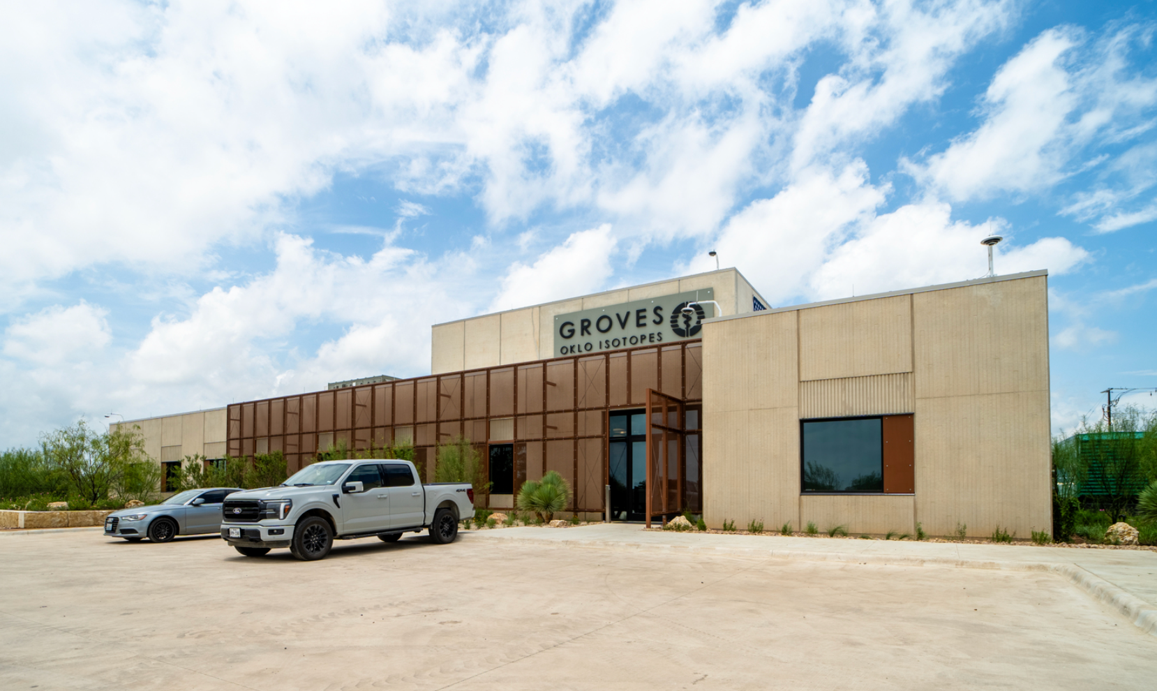 Oklo's Groves Isotope Test Reactor building in Texas under a clear sky