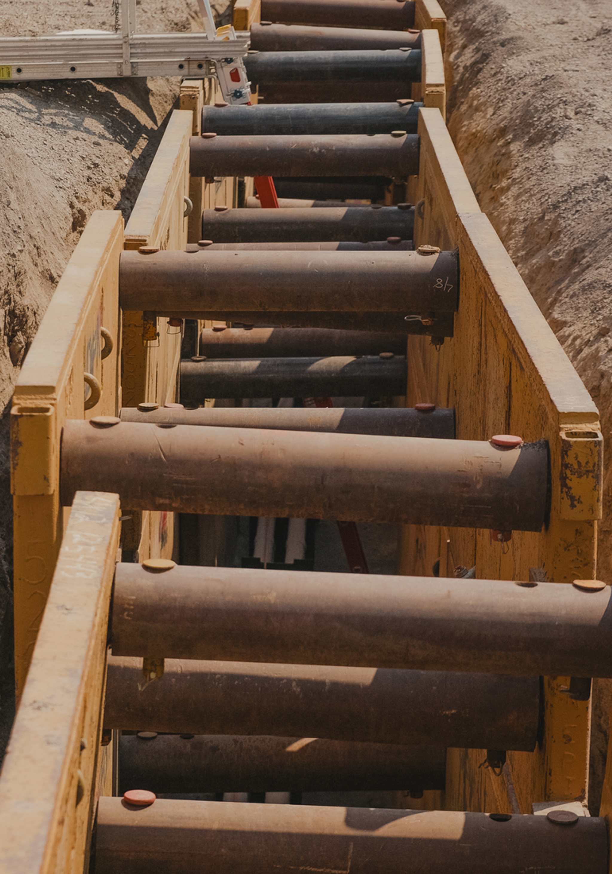 Overhead view of a trench with wooden support structures