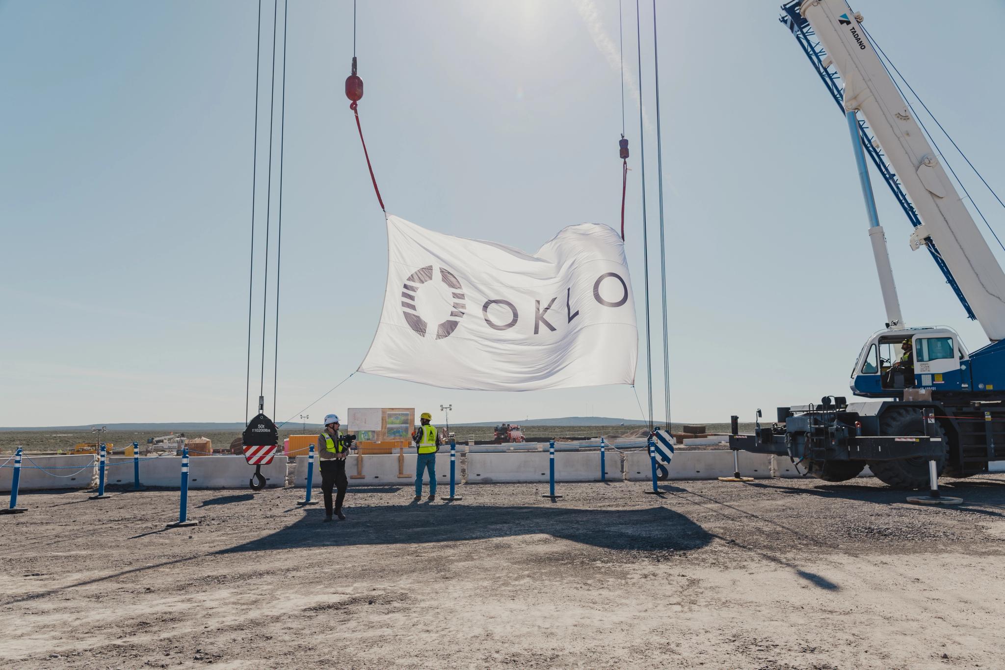 Oklo construction site with the company banner on a crane