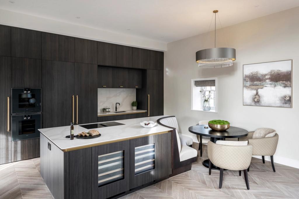 Dark wood kitchen with gold accents