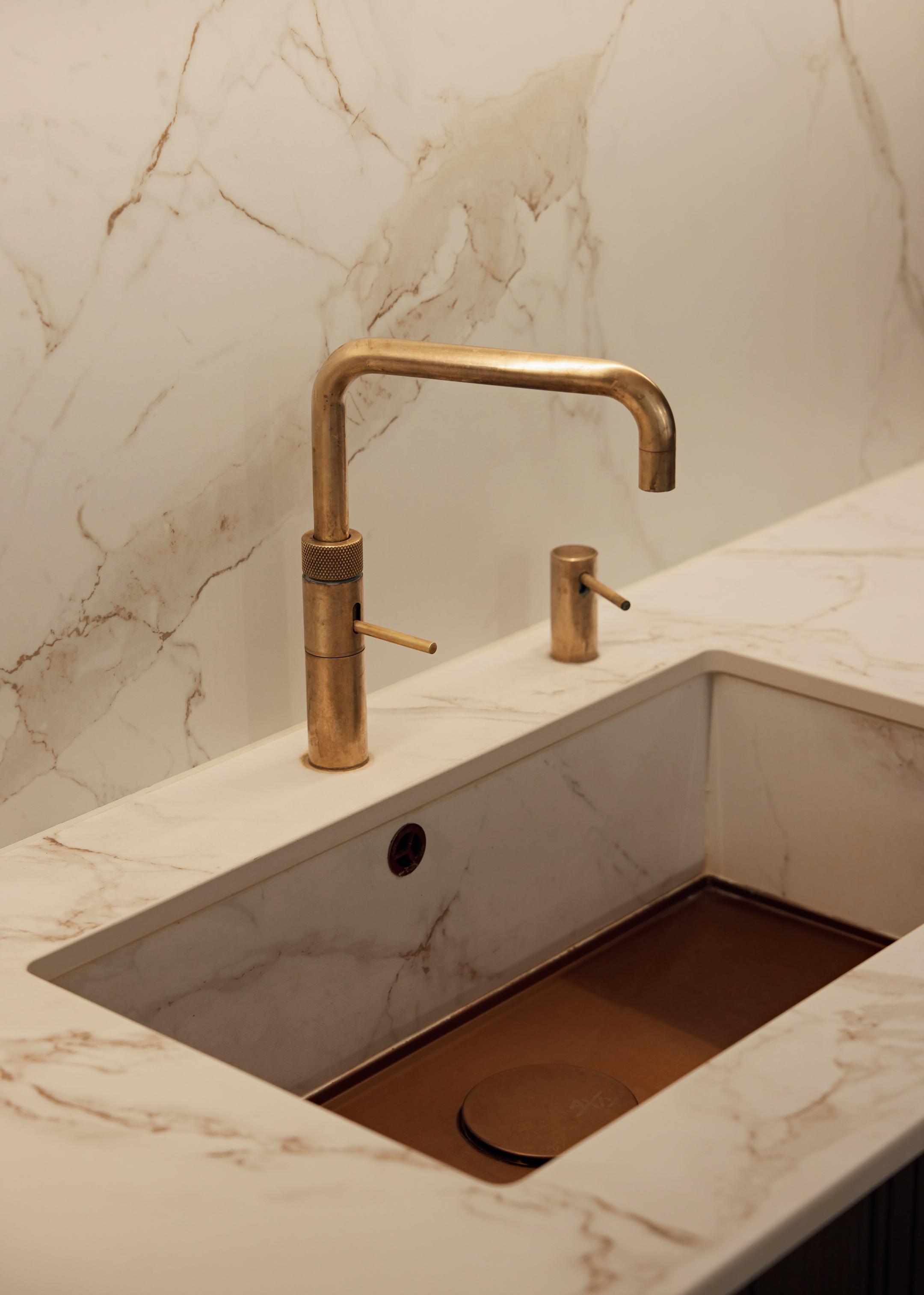 Patinated brass Quooker Fusion Square with Dekton clad undermount sink