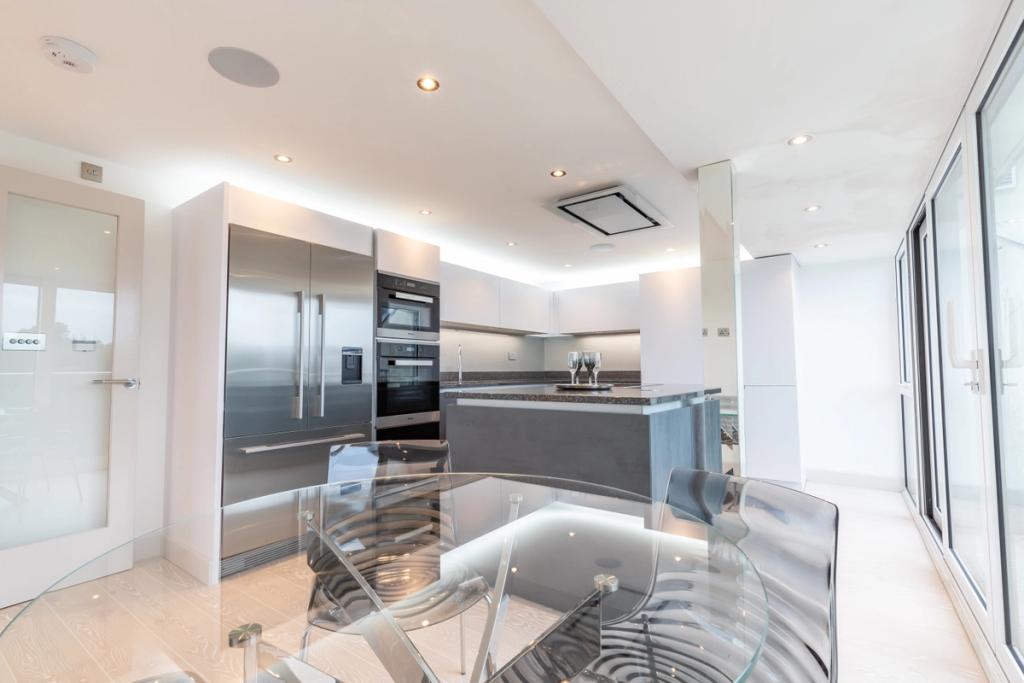 Charcoal handleless apartment kitchen