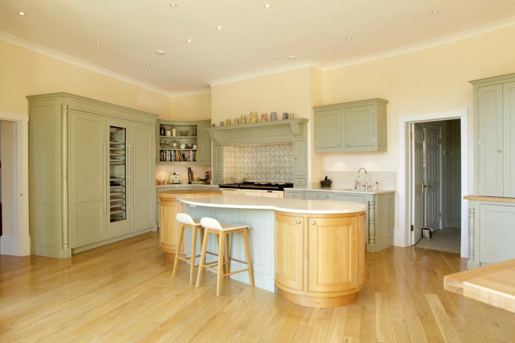 Sage shaker kitchen with oak