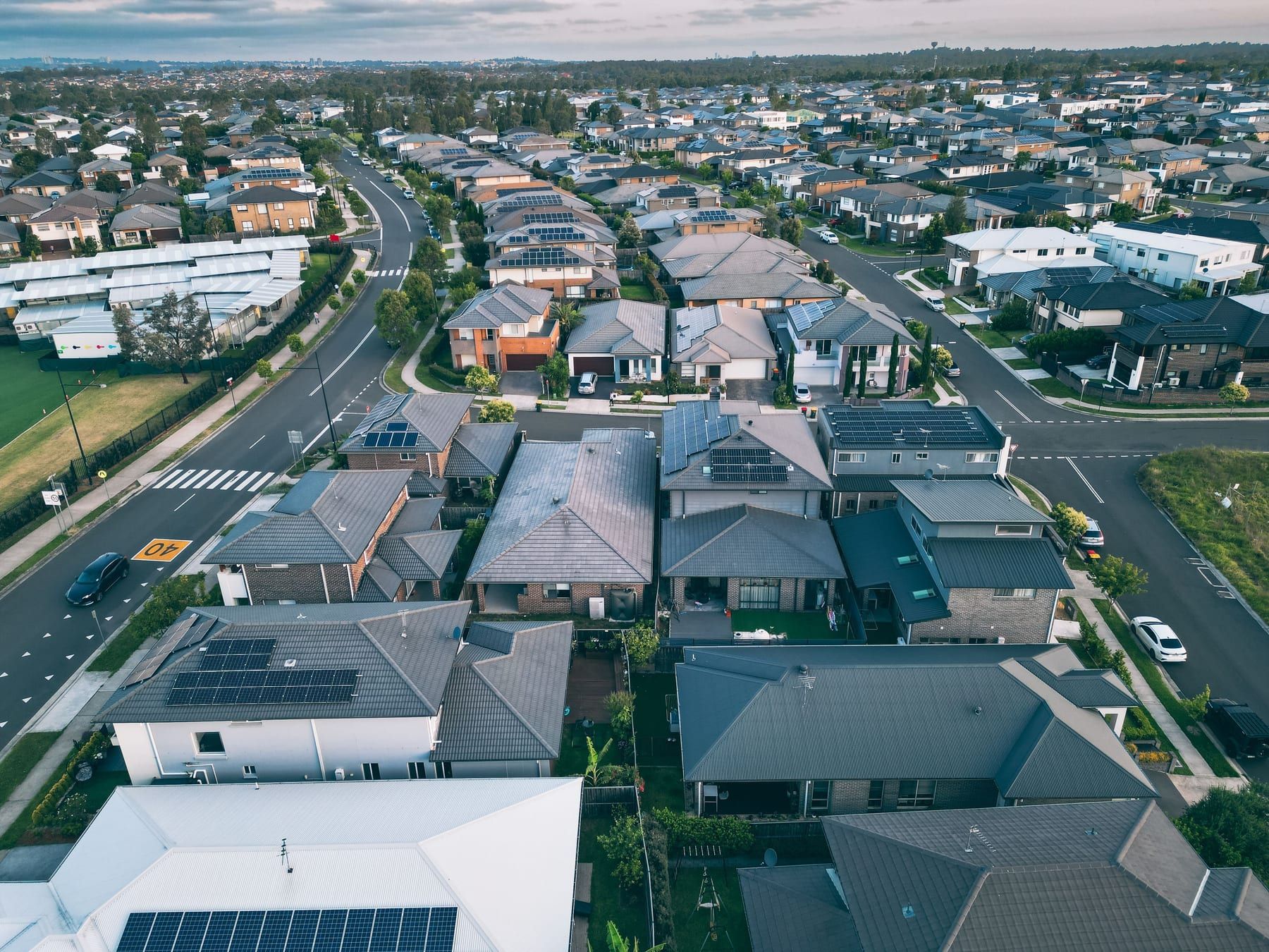 Suburban rooftops with solar systems