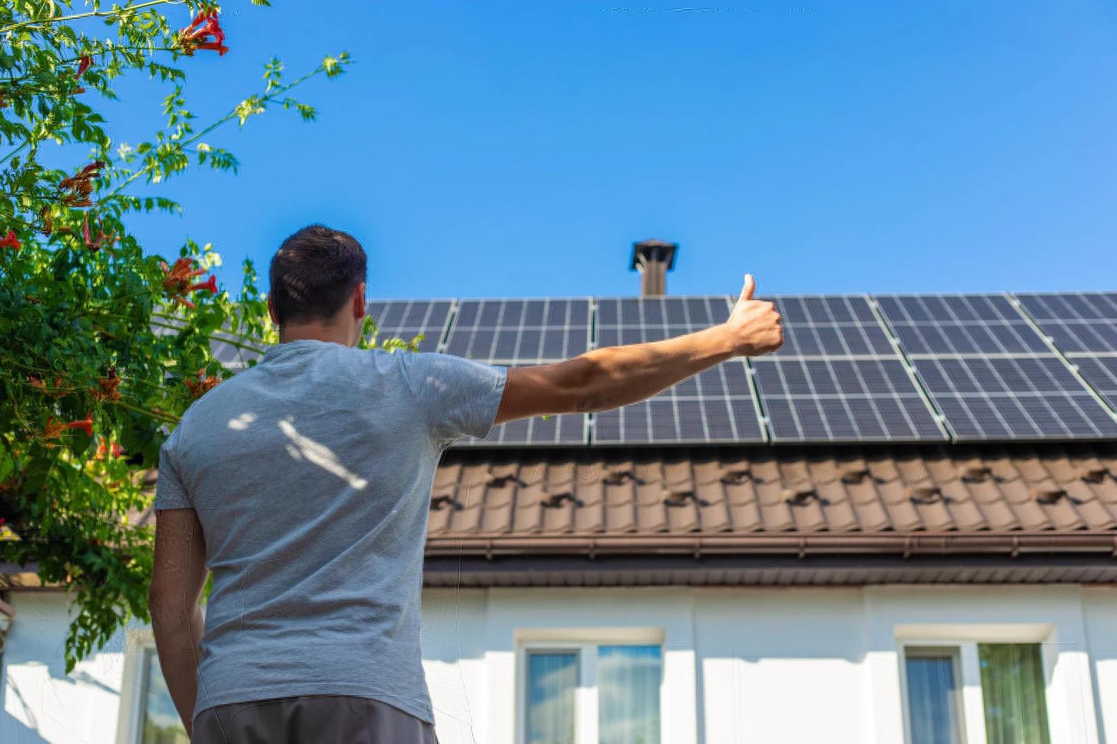 An NRN customer standing outside a home with solar panels​​​​‌﻿‍﻿​‍​‍‌‍﻿﻿‌﻿​‍‌‍‍‌‌‍‌﻿‌‍‍‌‌‍﻿‍​‍​‍​﻿‍‍​‍​‍‌﻿​﻿‌‍​‌‌‍﻿‍‌‍‍‌‌﻿‌​‌﻿‍‌​‍﻿‍‌‍‍‌‌‍﻿﻿​‍​‍​‍﻿​​‍​‍‌‍‍​‌﻿​‍‌‍‌‌‌‍‌‍​‍​‍​﻿‍‍​‍​‍‌‍‍​‌﻿‌​‌﻿‌​‌﻿​​‌﻿​﻿​﻿‍‍​‍﻿﻿​‍﻿﻿‌‍﻿‍‌﻿​‍‌‍﻿‍​‍﻿‌‌‍​﻿‌‍﻿﻿‌﻿​‍‌‍‌‌​‍﻿‌‌﻿‌﻿‌‍‌‌‌‍​‍‌﻿​﻿‌‍‍‌‌﻿‌​‌‍‌‌​‍﻿‍‌﻿​﻿‌‍​‌‌‍﻿‍‌‍‍‌‌﻿‌​‌﻿‍‌​‍﻿‍‌﻿​﻿‌﻿‌​‌﻿‌‌‌‍‌​‌‍‍‌‌‍﻿﻿​‍﻿﻿‌‍‍‌‌‍﻿‍‌﻿‌​‌‍‌‌‌‍﻿‍‌﻿‌​​‍﻿﻿‌‍‌‌‌‍‌​‌‍‍‌‌﻿‌​​‍﻿﻿‌‍﻿‌‌‍﻿﻿‌‍‌​‌‍‌‌​﻿﻿‌‌﻿​​‌﻿​‍‌‍‌‌‌﻿​﻿‌‍‌‌‌‍﻿‍‌﻿‌​‌‍​‌‌﻿‌​‌‍‍‌‌‍﻿﻿‌‍﻿‍​﻿‍﻿‌‍‍‌‌‍‌​​﻿﻿‌‌‍‍​‌‍﻿﻿‌‍﻿‌‌‍‌‌‌‌​​‌‍​‌‌‍‌﻿‌‍‌‌‌‌‌‍​﻿‌​​﻿‍﻿‌﻿‌​‌﻿‍‌‌﻿​​‌‍‌‌​﻿﻿‌‌‍‍​‌‍﻿﻿‌‍﻿‌‌‍‌‌‌‌​​‌‍​‌‌‍‌﻿‌‍‌‌‌‌‌‍​﻿‌​​﻿‍﻿‌﻿​​‌‍​‌‌﻿‌​‌‍‍​​﻿﻿‌‌﻿‌​‌‍‌‌‌﻿​﻿‌﻿‌​‌‍‍‌‌‍﻿‌‌‍﻿﻿‌‍﻿‍‌‍‍‌‌‍​‌‌‍﻿​​‍﻿‍‌‍‍‌‌‍﻿‌‌‍​‌‌‍‌﻿‌‍‌‌​‍﻿‍‌‍​‌‌‍﻿​‌﻿‌​​﻿﻿﻿‌‍​‍‌‍​‌‌﻿​﻿‌‍‌‌‌‌‌‌‌﻿​‍‌‍﻿​​﻿﻿‌‌‍‍​‌﻿‌​‌﻿‌​‌﻿​​‌﻿​﻿​‍‌‌​﻿​﻿‌​​‌​‍‌‌​﻿​‍‌​‌‍​‍‌‌​﻿​‍‌​‌‍‌‍﻿‍‌﻿​‍‌‍﻿‍​‍﻿‌‌‍​﻿‌‍﻿﻿‌﻿​‍‌‍‌‌​‍﻿‌‌﻿‌﻿‌‍‌‌‌‍​‍‌﻿​﻿‌‍‍‌‌﻿‌​‌‍‌‌​‍﻿‍‌﻿​﻿‌‍​‌‌‍﻿‍‌‍‍‌‌﻿‌​‌﻿‍‌​‍﻿‍‌﻿​﻿‌﻿‌​‌﻿‌‌‌‍‌​‌‍‍‌‌‍﻿﻿​‍‌‍‌‍‍‌‌‍‌​​﻿﻿‌‌‍‍​‌‍﻿﻿‌‍﻿‌‌‍‌‌‌‌​​‌‍​‌‌‍‌﻿‌‍‌‌‌‌‌‍​﻿‌​​‍‌‍‌﻿‌​‌﻿‍‌‌﻿​​‌‍‌‌​﻿﻿‌‌‍‍​‌‍﻿﻿‌‍﻿‌‌‍‌‌‌‌​​‌‍​‌‌‍‌﻿‌‍‌‌‌‌‌‍​﻿‌​​‍‌‍‌﻿​​‌‍​‌‌﻿‌​‌‍‍​​﻿﻿‌‌﻿‌​‌‍‌‌‌﻿​﻿‌﻿‌​‌‍‍‌‌‍﻿‌‌‍﻿﻿‌‍﻿‍‌‍‍‌‌‍​‌‌‍﻿​​‍﻿‍‌‍‍‌‌‍﻿‌‌‍​‌‌‍‌﻿‌‍‌‌​‍﻿‍‌‍​‌‌‍﻿​‌﻿‌​​‍‌‍‌﻿​​‌‍‌‌‌﻿​‍‌﻿​﻿‌﻿​​‌‍‌‌‌‍​﻿‌﻿‌​‌‍‍‌‌﻿‌‍‌‍‌‌​﻿﻿‌‌﻿​​‌﻿‌‌‌‍​‍‌‍﻿​‌‍‍‌‌﻿​﻿‌‍‍​‌‍‌‌‌‍‌​​‍​‍‌﻿﻿‌