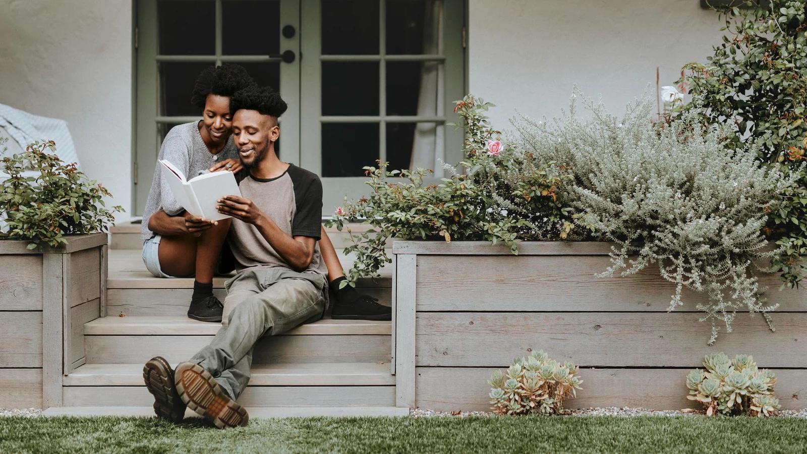 A couple reviewing their options together at home