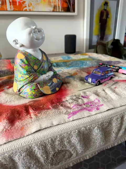 Painted Buddha by Mark Staples
