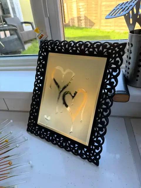 Hand-etched mirror by Mark Staples