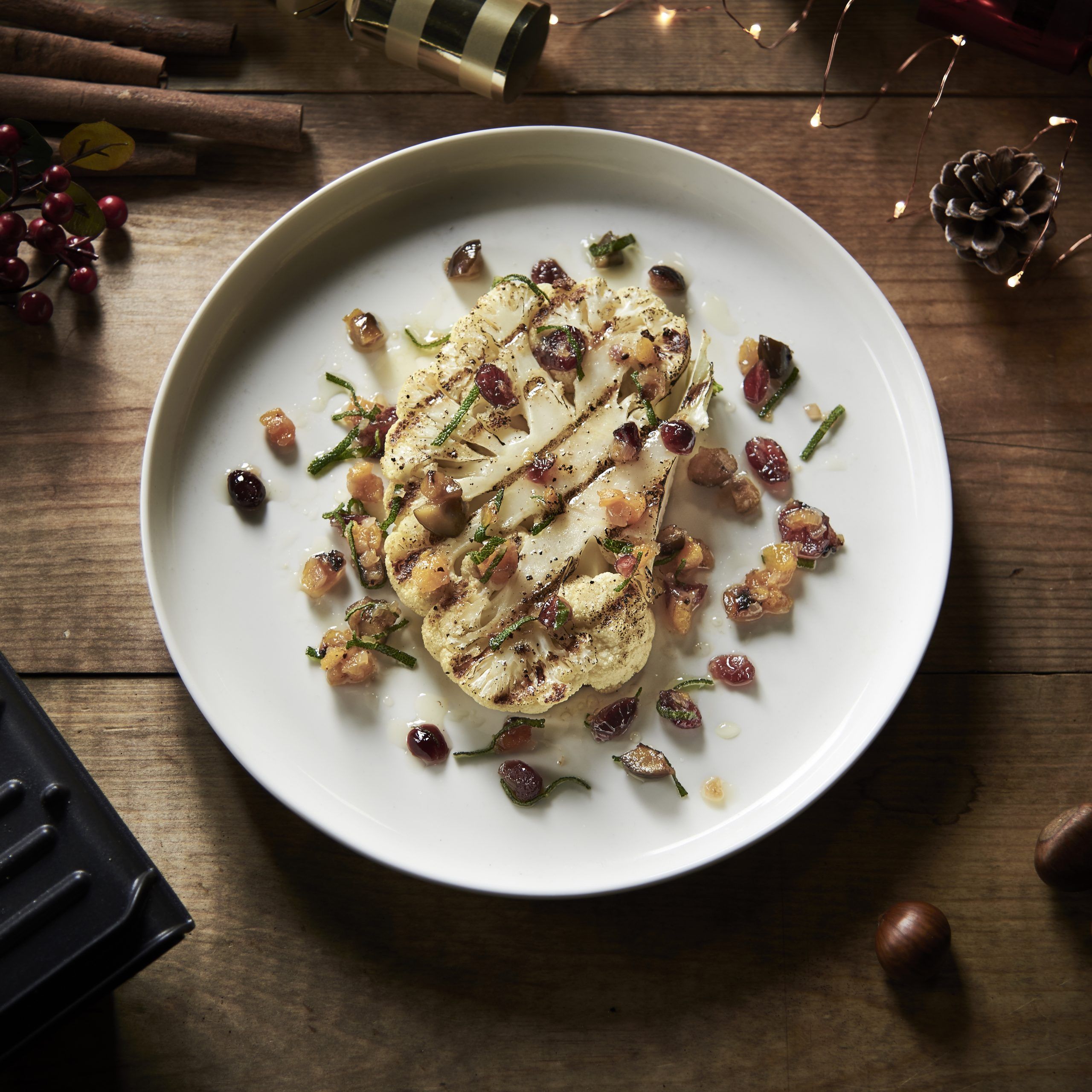 Cauliflower steak with a warm chestnut, cranberry and sage dressing