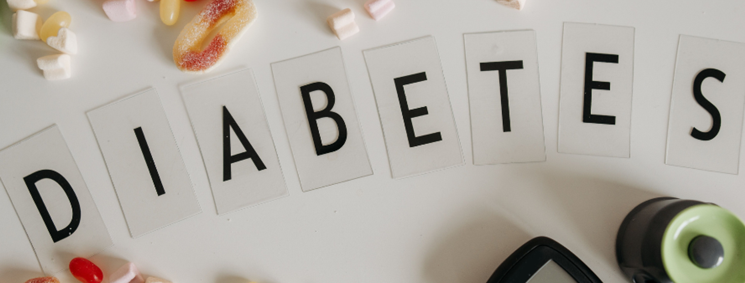 A blood glucose testing kit on a table
