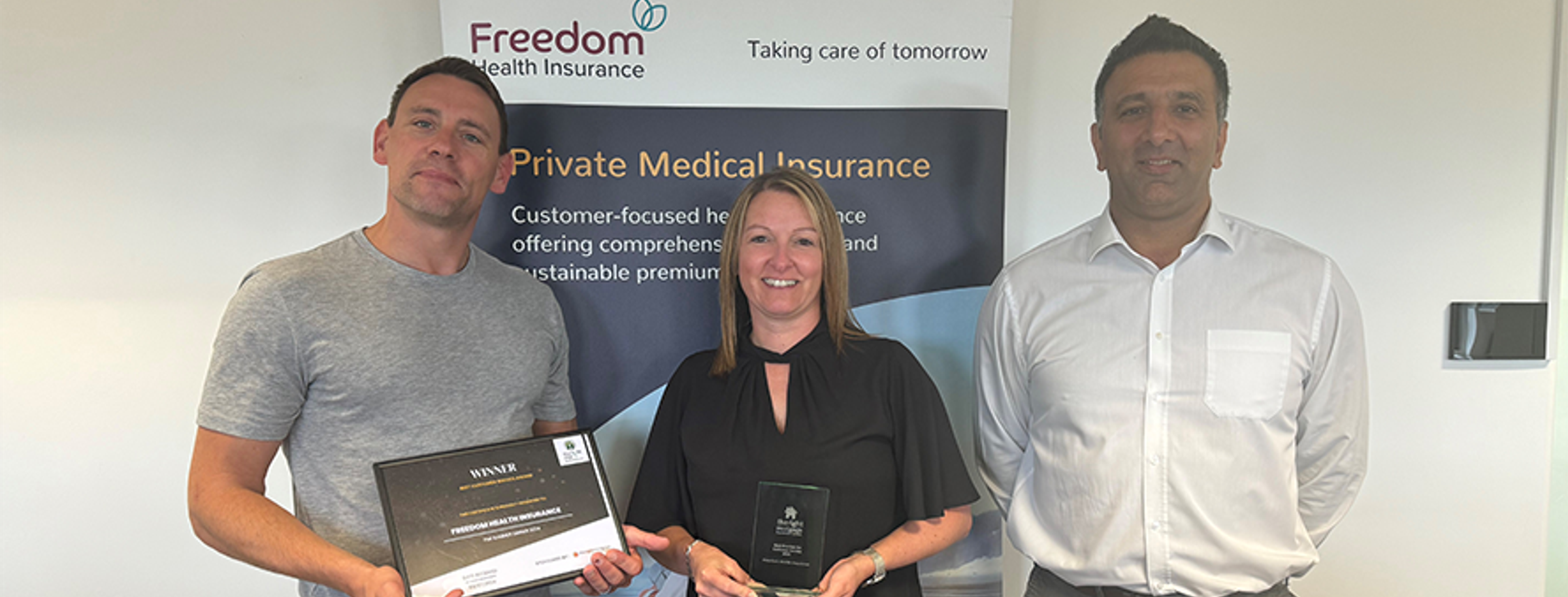 Freedom Health Insurance team with Best Customer Service award