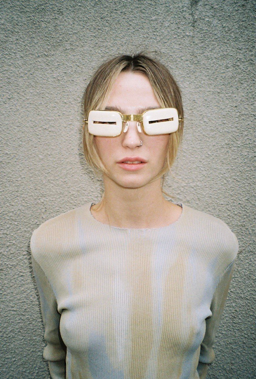 woman wears mammoth tusk guard goggles profile