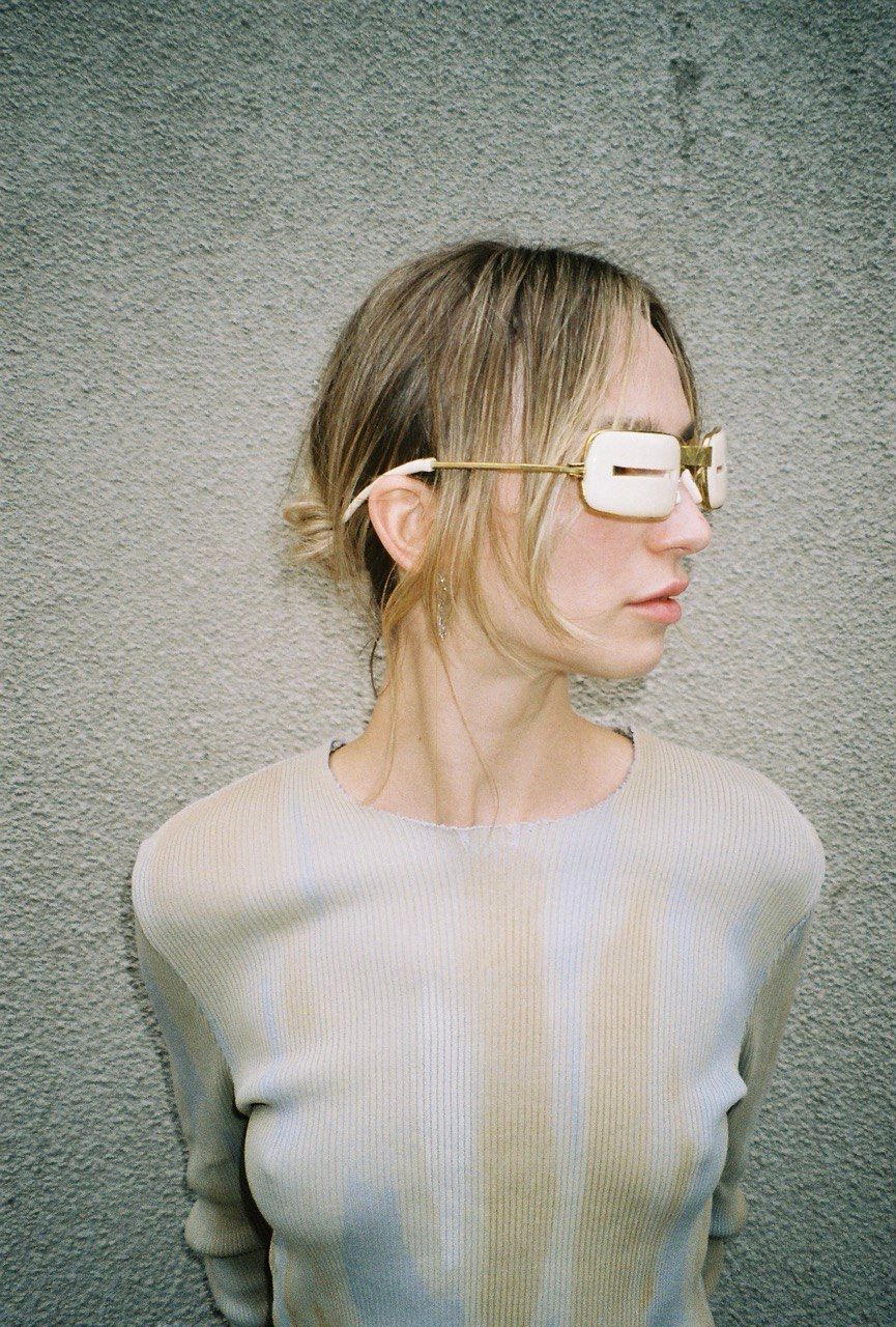 woman wears mammoth tusk guard goggles side