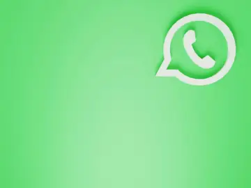 Logo aplikace WhatsApp na světlém zeleném pozadí.