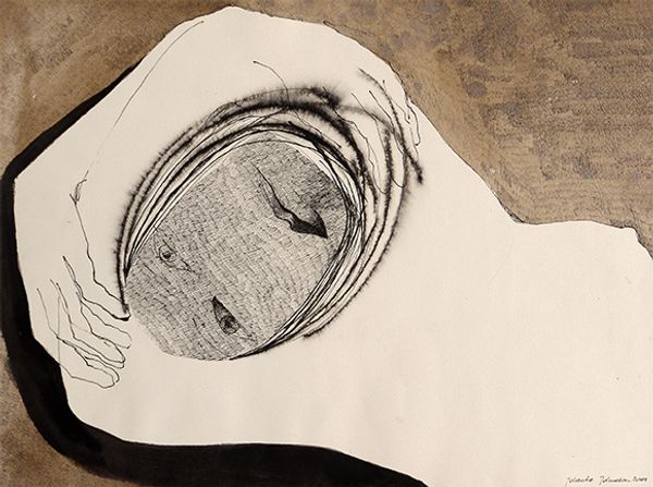 Bookcase filled with art