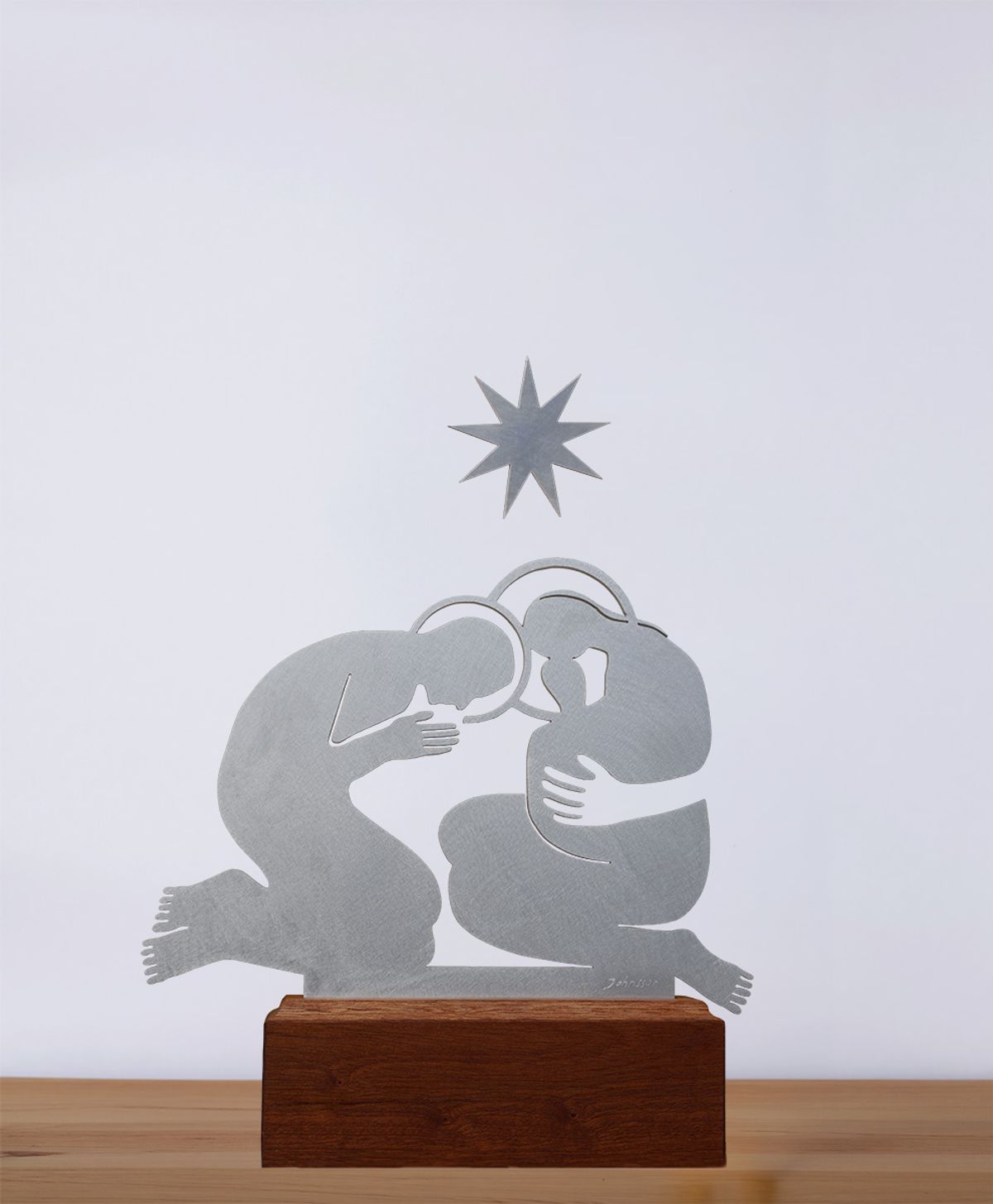 Jolanta Johnsson, Holy Family, sculpture, figures of aluminium plate, star above, wooden basis