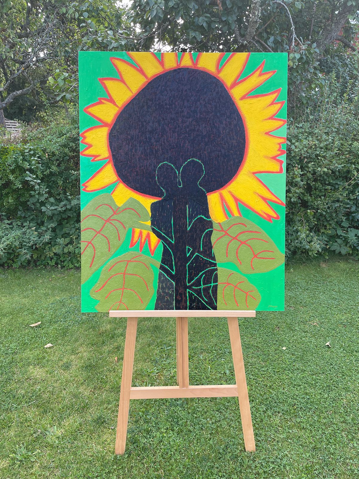 oil painting, two people under a big sunflower - on easel