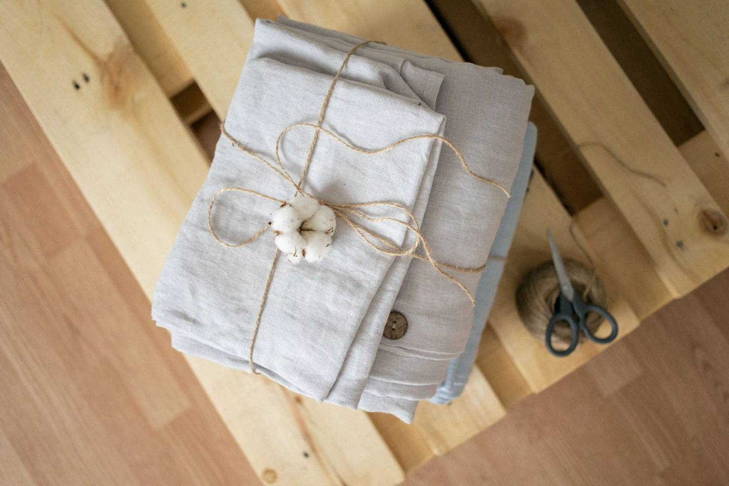 Neutral fabric swatches and sourcing notes for sustainable small-batch apparel production