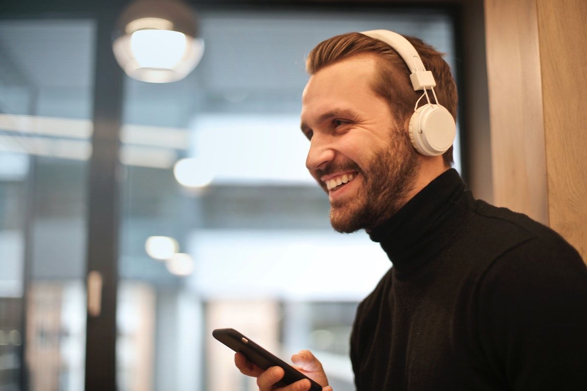 A man listening to a podcast