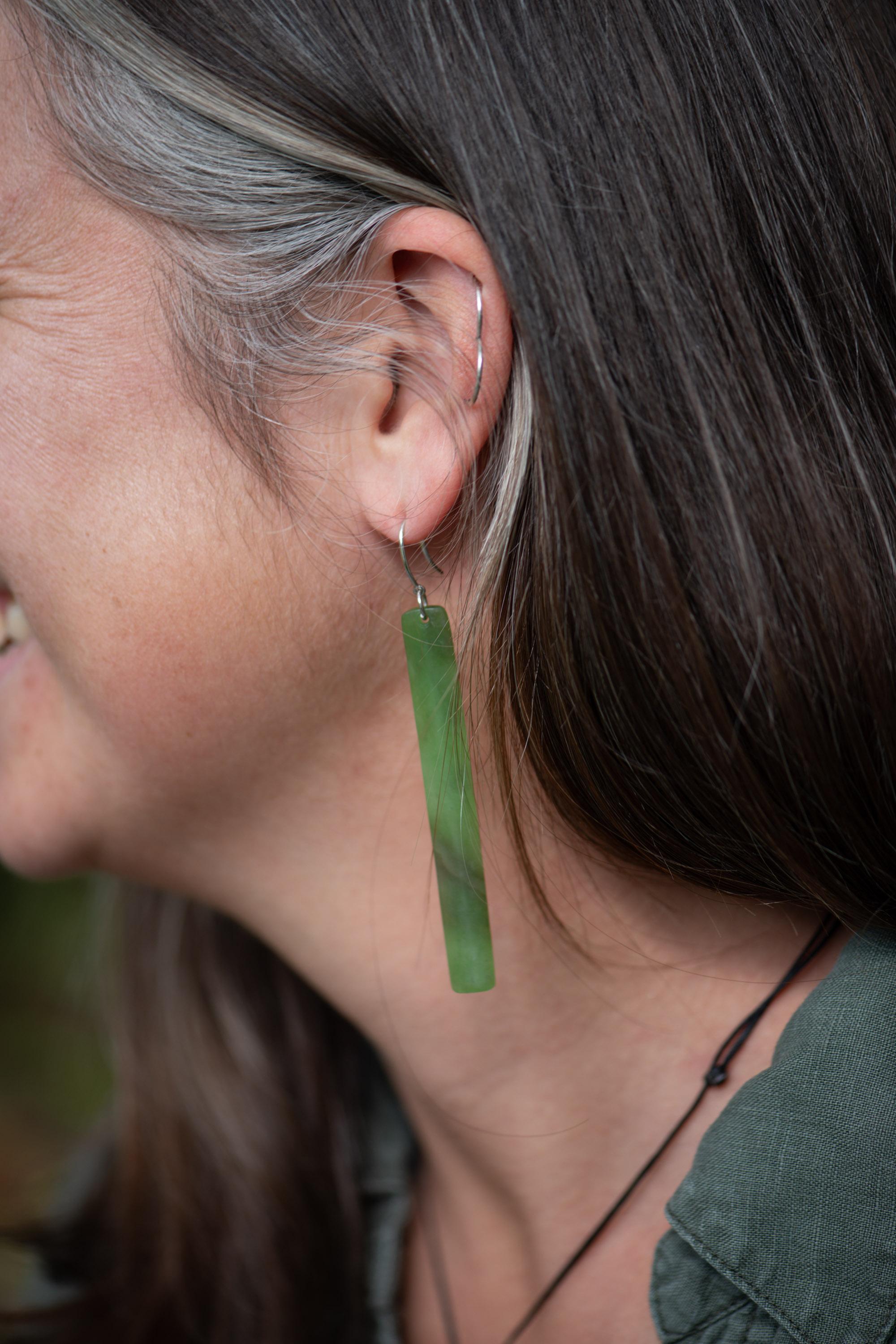 Model wearing new zealand jade earrings