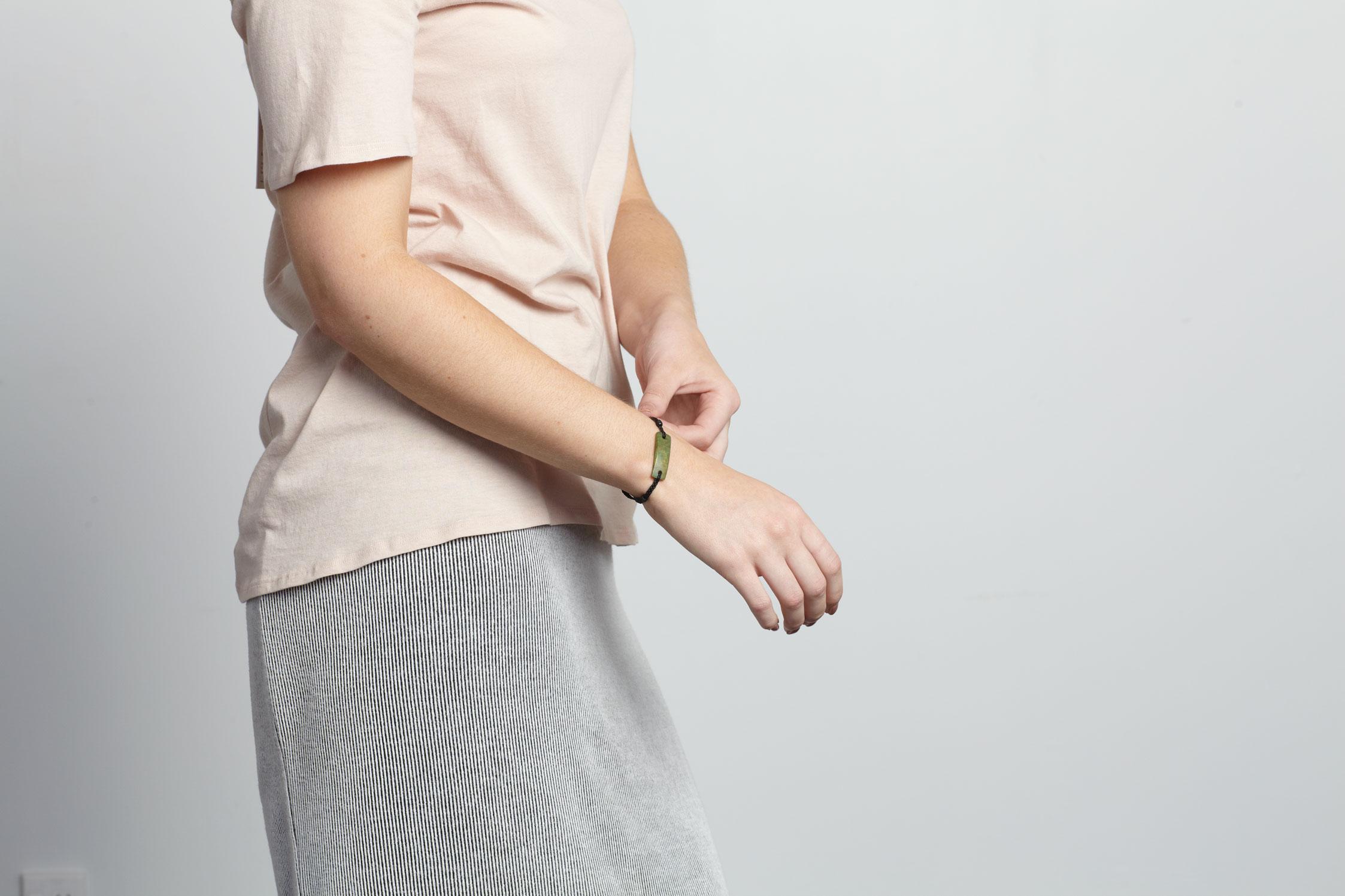 Lady wearing adjustable pounamu bracelet