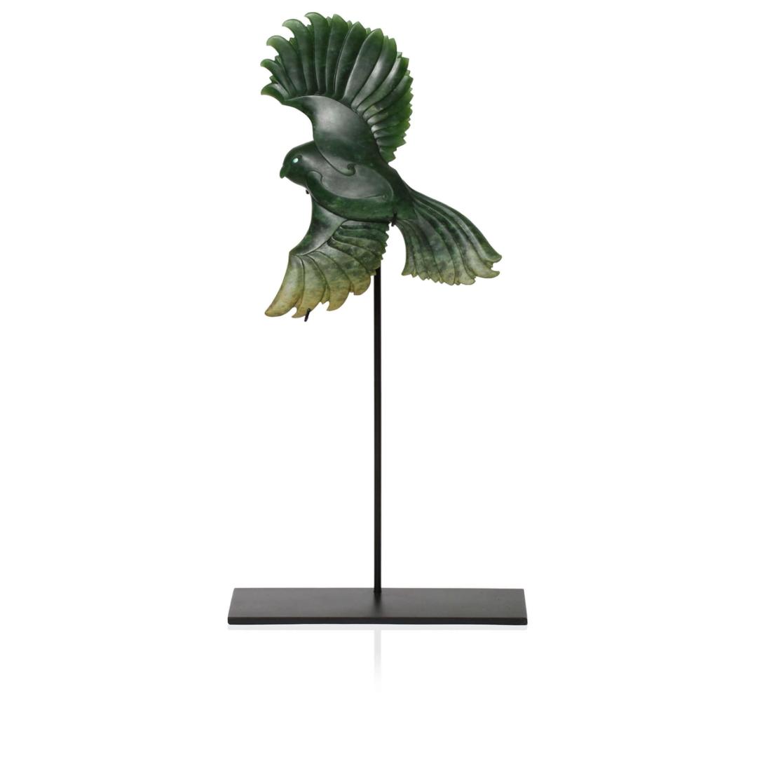 Hand carved pounamu wooden sculpture