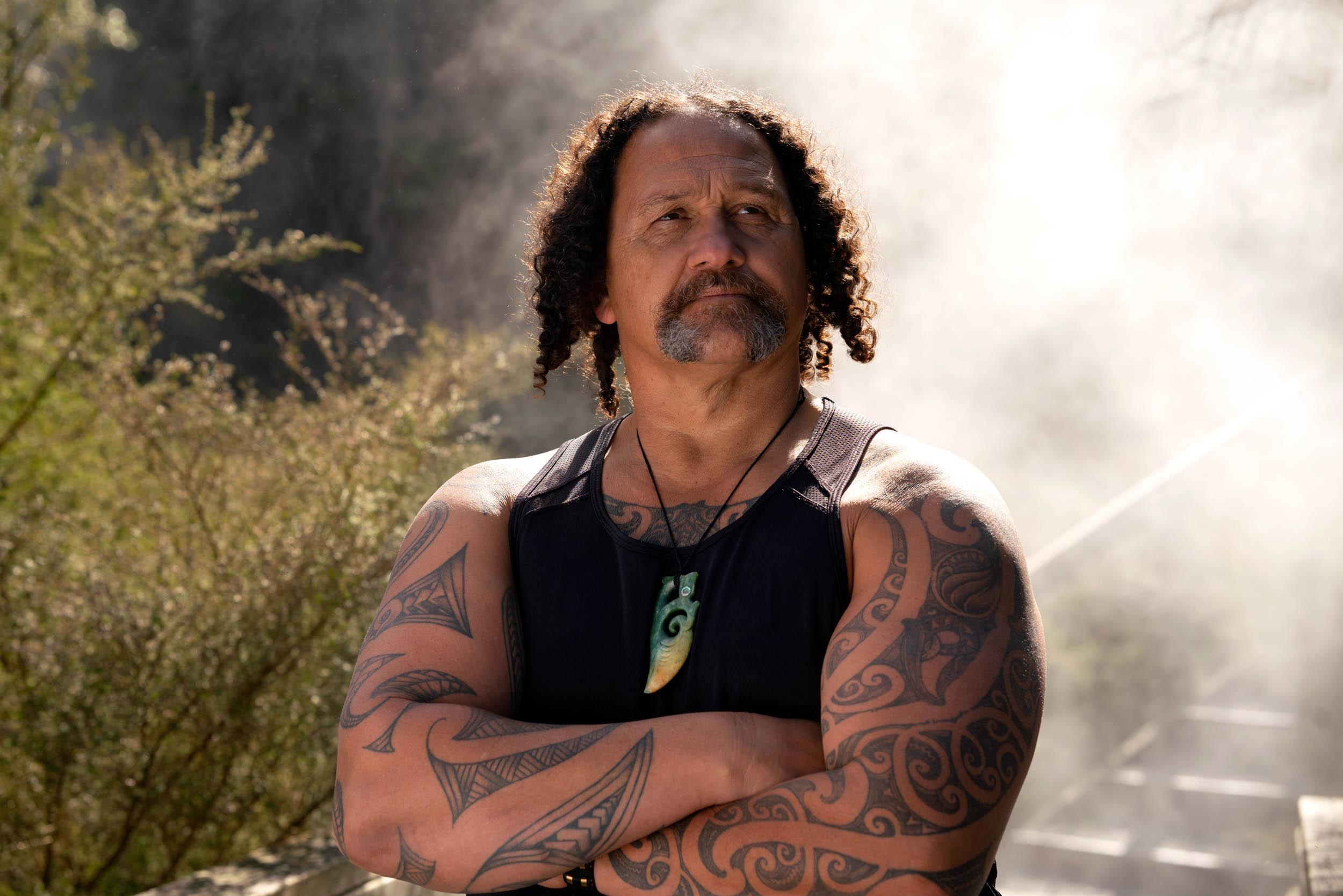 Man wears Pounamu Manaia