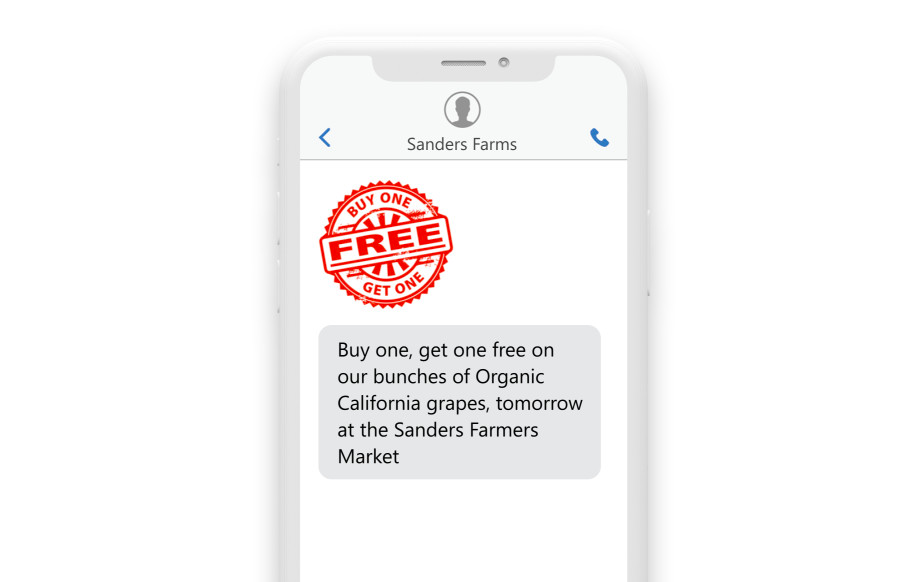 a phone with the message: “Buy one, get one free on our bunches of Organic California grapes, tomorrow at the Sanders Farmers Market.”